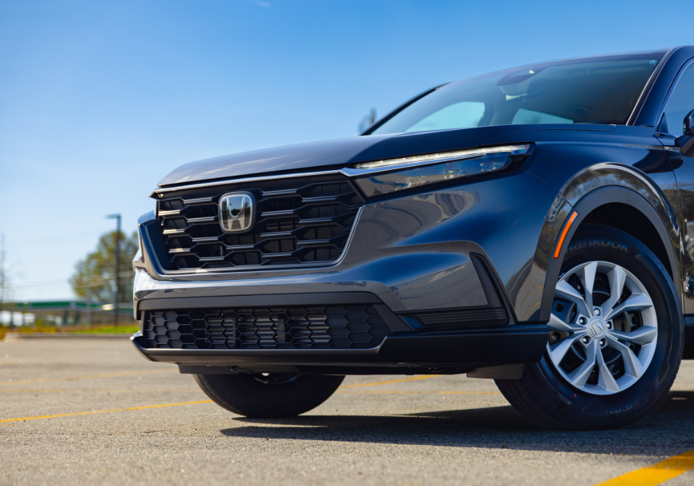 Close up of the front grille of the 2026 Honda CR-V parked in an empty lot